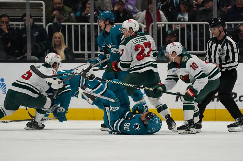 Apr 13, 2024; San Jose, California, USA; San Jose Sharks right wing Justin Bailey (90) falls to the ice during the second period at SAP Center at San Jose. Mandatory Credit: David Gonzales-USA TODAY Sports