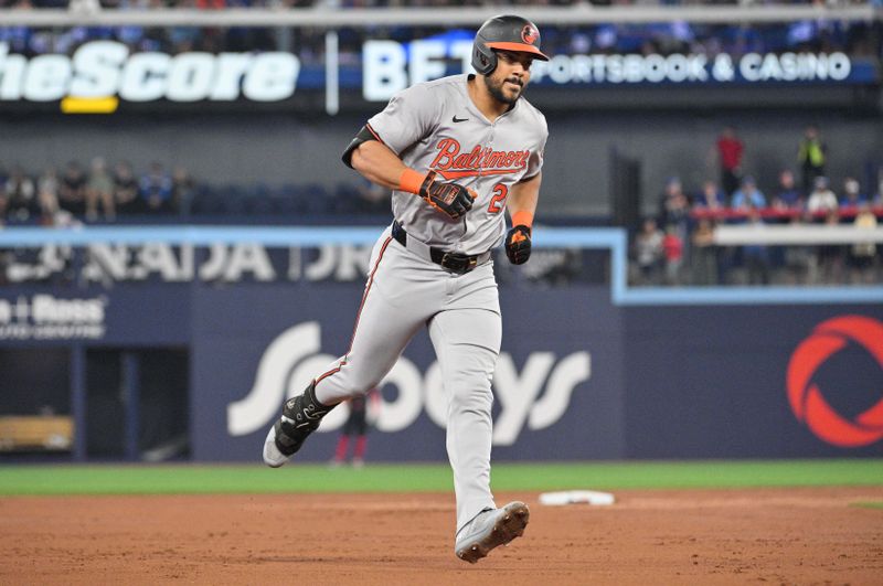 Jun 5, 2024; Toronto, Ontario, CAN;  Baltimore Orioles designated hitter Anthony Santander (25) rounds the bases after hitting a solo home run against the Toronto Blue Jays in the second inning at Rogers Centre. Mandatory Credit: Dan Hamilton-USA TODAY Sports 