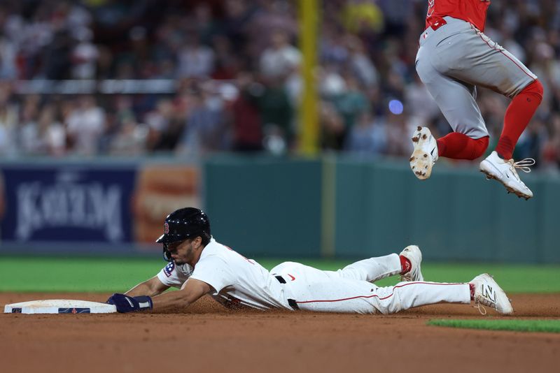 Jun 3, 2025; Boston, Massachusetts, USA; Boston Red Sox second baseman David Hamilton (17) steals second during the ninth inning against the Los Angeles Angels at Fenway Park. Mandatory Credit: Paul Rutherford-Imagn Images