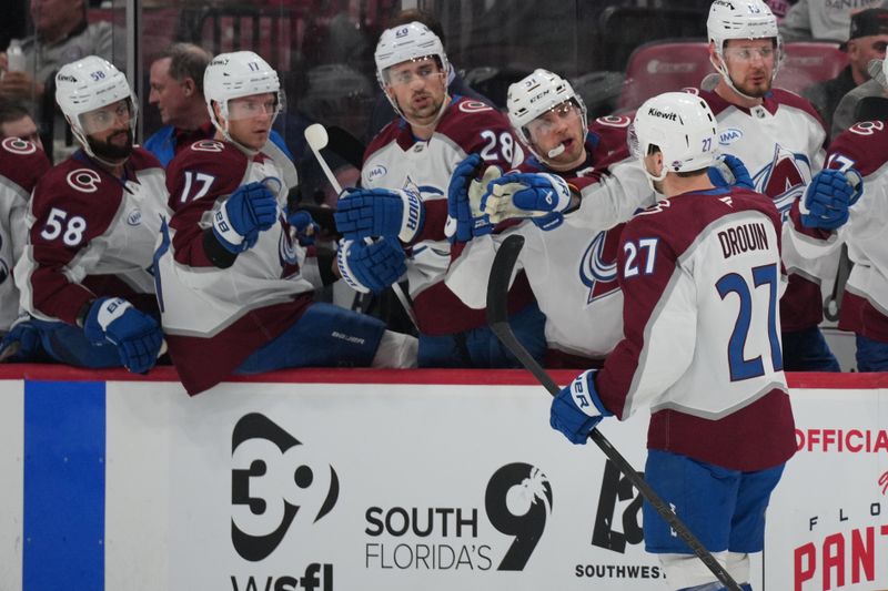 Nov 23, 2024; Sunrise, Florida, USA;  Colorado Avalanche left wing Jonathan Drouin (27) celebrates after scoring a goal against the Florida Panthers in the first period at Amerant Bank Arena. Mandatory Credit: Jim Rassol-Imagn Images