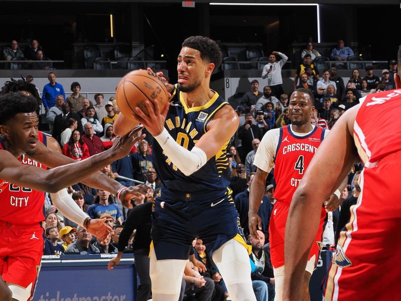 INDIANAPOLIS, IN - NOVEMBER 25: Tyrese Haliburton #0 of the Indiana Pacers passes the ball during the game against the New Orleans Pelicans on November 25, 2024 at Gainbridge Fieldhouse in Indianapolis, Indiana. NOTE TO USER: User expressly acknowledges and agrees that, by downloading and or using this Photograph, user is consenting to the terms and conditions of the Getty Images License Agreement. Mandatory Copyright Notice: Copyright 2024 NBAE (Photo by Ron Hoskins/NBAE via Getty Images)