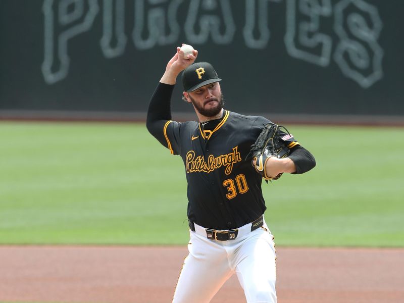 May 1, 2025; Pittsburgh, Pennsylvania, USA;  Pittsburgh Pirates starting pitcher Paul Skenes (30) delivers a pitch against the Chicago Cubs during the first inning at PNC Park. Mandatory Credit: Charles LeClaire-Imagn Imagesn