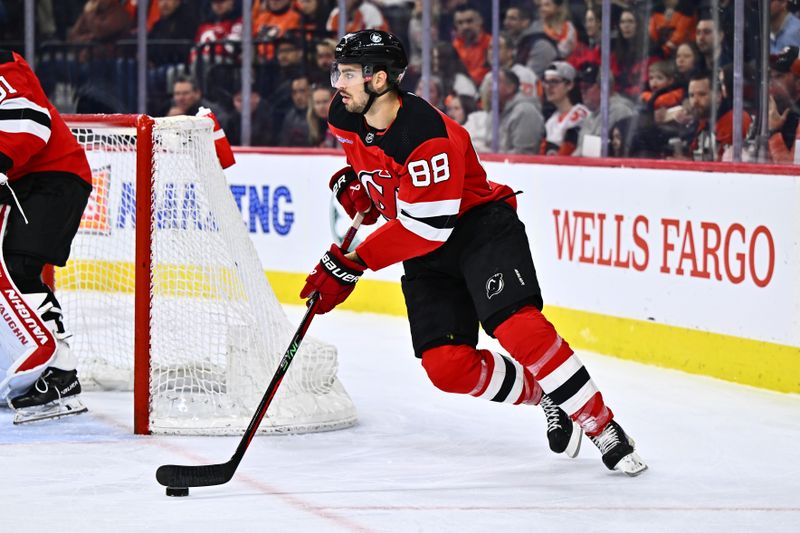 Apr 13, 2024; Philadelphia, Pennsylvania, USA; New Jersey Devils defenseman Kevin Bahl (88) controls the puck against the Philadelphia Flyers in the first period at Wells Fargo Center. Mandatory Credit: Kyle Ross-USA TODAY Sports