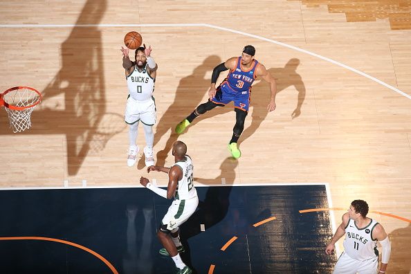 NEW YORK, NY - DECEMBER 23: Damian Lillard #0 of the Milwaukee Bucks grabs the rebound during the game   on December 23, 2023 at Madison Square Garden in New York City, New York.  NOTE TO USER: User expressly acknowledges and agrees that, by downloading and or using this photograph, User is consenting to the terms and conditions of the Getty Images License Agreement. Mandatory Copyright Notice: Copyright 2023 NBAE  (Photo by Nathaniel S. Butler/NBAE via Getty Images)