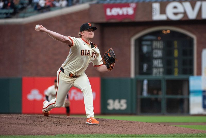 Apr 23, 2024; San Francisco, California, USA;  San Francisco Giants pitcher Logan Webb (62) throws a pitch during the third inning at Oracle Park. Mandatory Credit: Ed Szczepanski-USA TODAY Sports