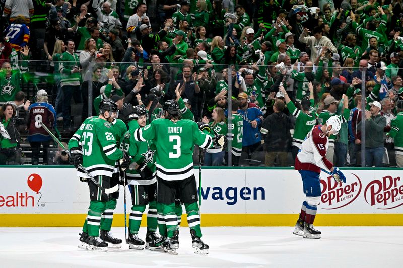 May 9, 2024; Dallas, Texas, USA; Dallas Stars defenseman Esa Lindell (23) and center Roope Hintz (24) and center Wyatt Johnston (53) and defenseman Chris Tanev (3) and center Tyler Seguin (91) celebrates after Lindell scores an empty net goal against the Colorado Avalanche during the third period in game two of the second round of the 2024 Stanley Cup Playoffs at American Airlines Center. Mandatory Credit: Jerome Miron-USA TODAY Sports