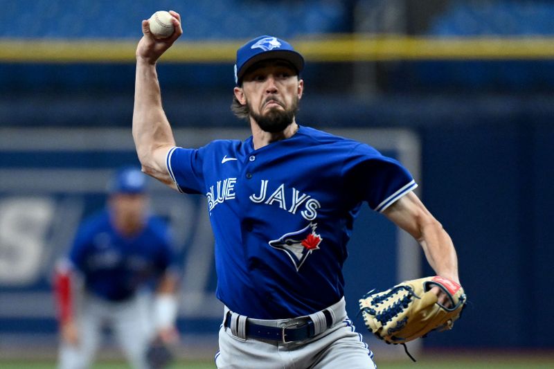 Mar 9, 2023; St. Petersburg, Florida, USA; Toronto Blue Jays pitcher Casey Lawrence (62) throws a pitch in the first inning of a spring training game against the Tampa Bay Rays  at Tropicana Field. Mandatory Credit: Jonathan Dyer-USA TODAY Sports