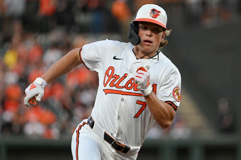 Apr 16, 2024; Baltimore, Maryland, USA;  Baltimore Orioles second baseman Jackson Holliday (7) rounds third base to score on shortstop Gunnar Henderson (not pictured) third inning single against the Minnesota Twins at Oriole Park at Camden Yards. Mandatory Credit: Tommy Gilligan-USA TODAY Sports