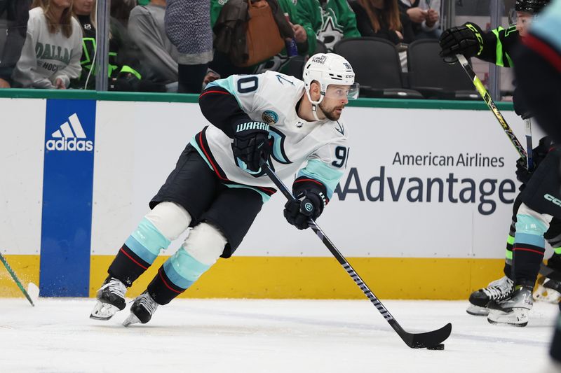 Apr 13, 2024; Dallas, Texas, USA; Seattle Kraken left wing Tomas Tatar (90) controls the puck against the Dallas Stars in the second period at American Airlines Center. Mandatory Credit: Tim Heitman-USA TODAY Sports