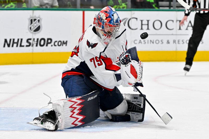 Jan 27, 2024; Dallas, Texas, USA; Washington Capitals goaltender Charlie Lindgren (79) makes a save on Dallas Stars shot during the second period at the American Airlines Center. Mandatory Credit: Jerome Miron-USA TODAY Sports