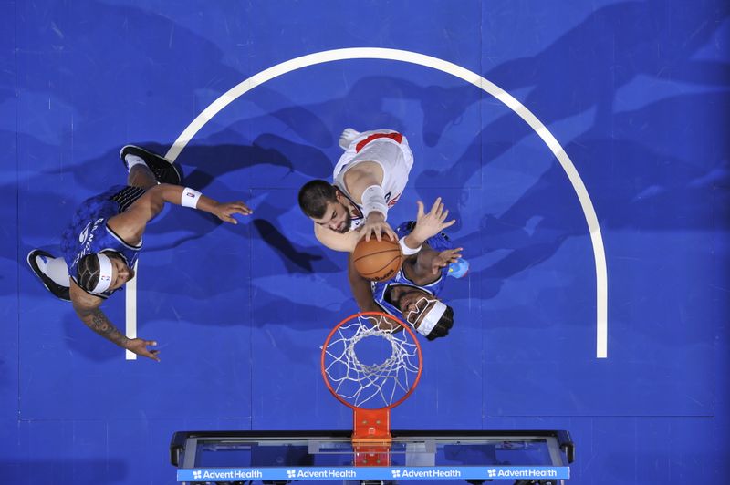 ORLANDO, FL - MARCH 29: Ivica Zubac #40 of the LA Clippers dunks the ball during the game against the Orlando Magic on March 29, 2024 at the Kia Center in Orlando, Florida. NOTE TO USER: User expressly acknowledges and agrees that, by downloading and or using this photograph, User is consenting to the terms and conditions of the Getty Images License Agreement. Mandatory Copyright Notice: Copyright 2024 NBAE (Photo by Fernando Medina/NBAE via Getty Images)