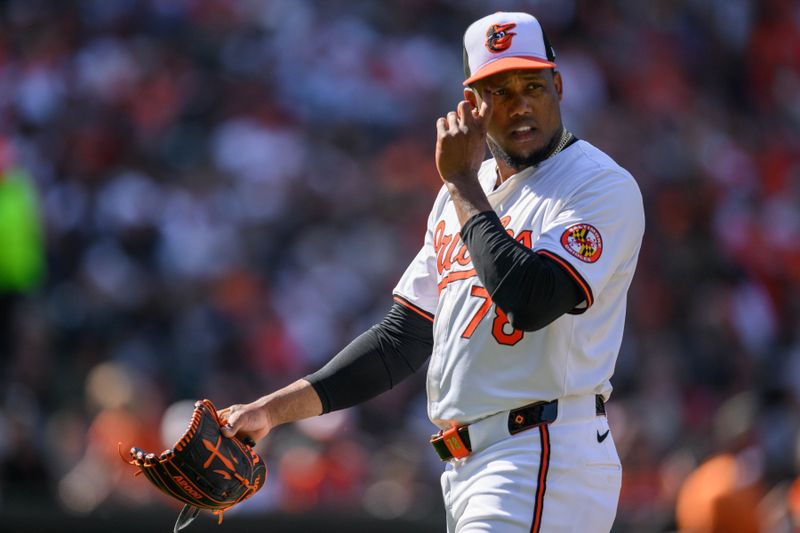 Apr 14, 2024; Baltimore, Maryland, USA; Baltimore Orioles pitcher Yennier Cano (78) looks on during the eighth inning against the Milwaukee Brewers at Oriole Park at Camden Yards. Mandatory Credit: Reggie Hildred-USA TODAY Sports