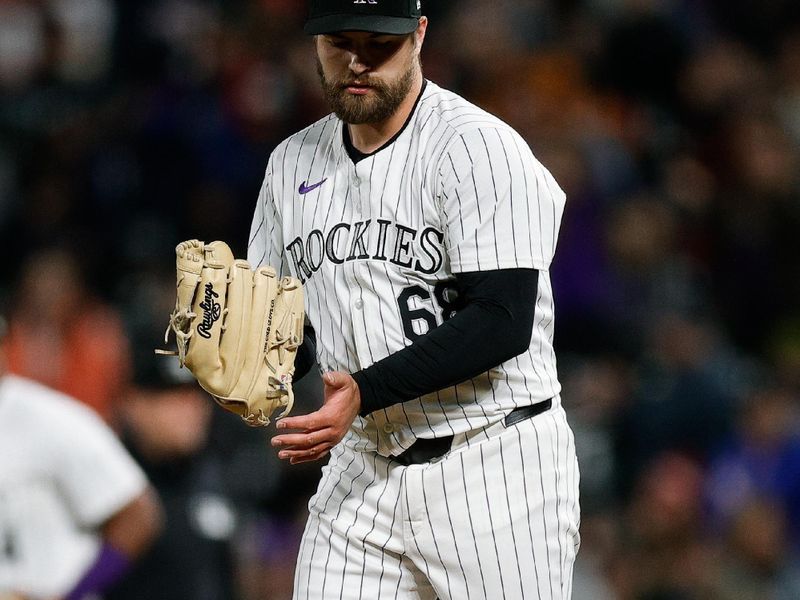 May 10, 2024; Denver, Colorado, USA; Colorado Rockies relief pitcher Jalen Beeks (68) reacts after the final out against the Texas Rangers at Coors Field. Mandatory Credit: Isaiah J. Downing-USA TODAY Sports