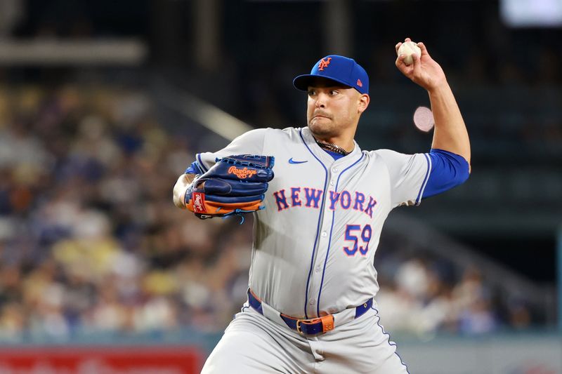 Apr 19, 2024; Los Angeles, California, USA;  New York Mets pitcher Sean Manaea (59) pitches during the fourth inning against the Los Angeles Dodgers at Dodger Stadium. Mandatory Credit: Kiyoshi Mio-USA TODAY Sports