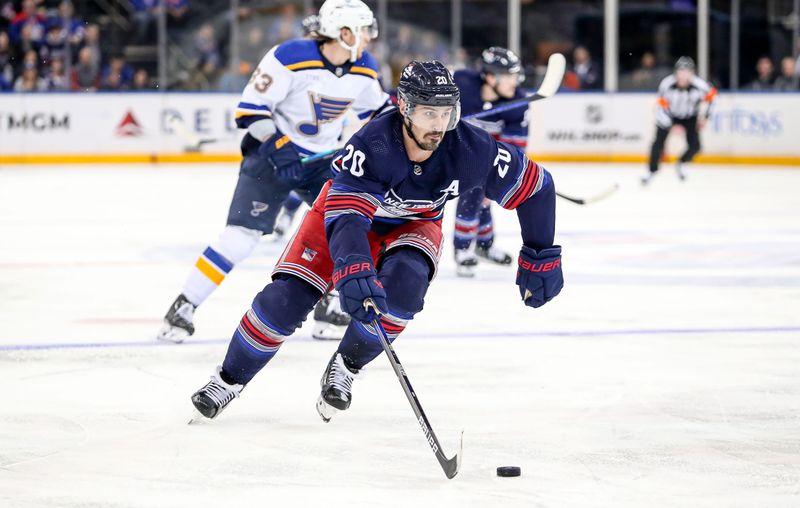 Mar 9, 2024; New York, New York, USA; New York Rangers left wing Chris Kreider (20) skates with the puck against the St. Louis Blues during the second period at Madison Square Garden. Mandatory Credit: Danny Wild-USA TODAY Sports