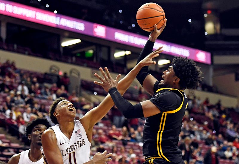 Feb 11, 2023; Tallahassee, Florida, USA; Pittsburgh Panthers forward Blake Hinson (2) shoots the ball over Florida State Seminoles forward Baba Miller (11) during the first half at Donald L. Tucker Center. Mandatory Credit: Melina Myers-USA TODAY Sports