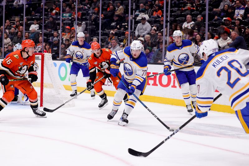 Nov 22, 2024; Anaheim, California, USA; Buffalo Sabres right wing JJ Peterka (77) moves the puck during the second period at Honda Center against the Anaheim Ducks. Mandatory Credit: Ryan Sun-Imagn Images