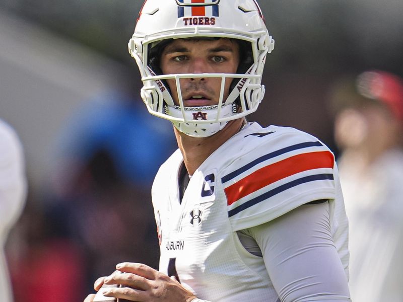 Oct 5, 2024; Athens, Georgia, USA; Auburn Tigers quarterback Payton Thorne (1) shown warming up prior to the game against the Georgia Bulldogs at Sanford Stadium. Mandatory Credit: Dale Zanine-Imagn Images