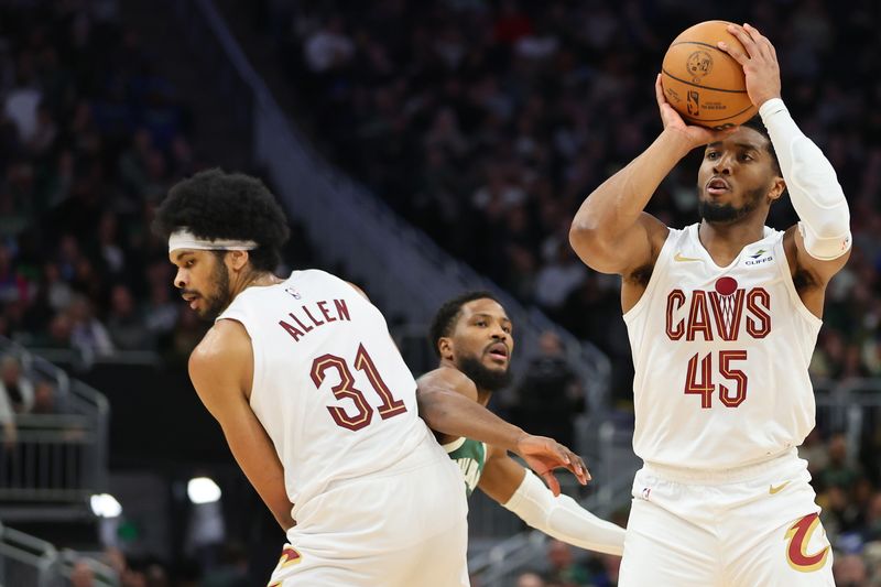 MILWAUKEE, WISCONSIN - JANUARY 24: Donovan Mitchell #45 of the Cleveland Cavaliers takes a shot during a game against the Milwaukee Bucks at Fiserv Forum on January 24, 2024 in Milwaukee, Wisconsin. NOTE TO USER: User expressly acknowledges and agrees that, by downloading and or using this photograph, User is consenting to the terms and conditions of the Getty Images License Agreement. (Photo by Stacy Revere/Getty Images)