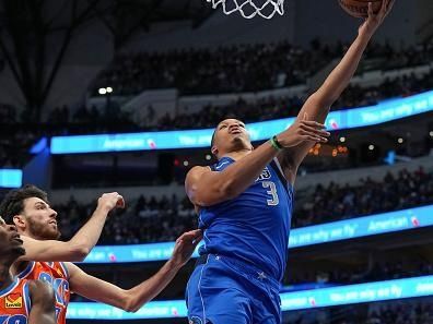 DALLAS, TX - DECEMBER 2: Grant Williams #3 of the Dallas Mavericks goes to the basket during the game on December 2, 2023 at the American Airlines Center in Dallas, Texas. NOTE TO USER: User expressly acknowledges and agrees that, by downloading and or using this photograph, User is consenting to the terms and conditions of the Getty Images License Agreement. Mandatory Copyright Notice: Copyright 2023 NBAE (Photo by Glenn James/NBAE via Getty Images)