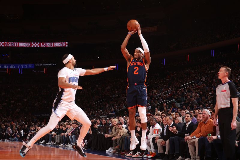 NEW YORK, NY - DECEMBER 3: Miles McBride #2 of the New York Knicks shoots a three point basket during the game  against the Orlando Magic during the Emirates NBA Cup on December 3, 2024 at Madison Square Garden in New York City, New York.  NOTE TO USER: User expressly acknowledges and agrees that, by downloading and or using this photograph, User is consenting to the terms and conditions of the Getty Images License Agreement. Mandatory Copyright Notice: Copyright 2024 NBAE  (Photo by Nathaniel S. Butler/NBAE via Getty Images)