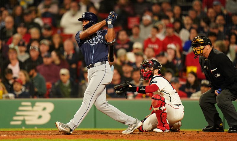 May 13, 2024; Boston, Massachusetts, USA; Tampa Bay Rays right fielder Amed Rosario (10) doubles to left field to drive in a run against the Boston Red Sox in the eighth inning at Fenway Park. Mandatory Credit: David Butler II-USA TODAY Sports