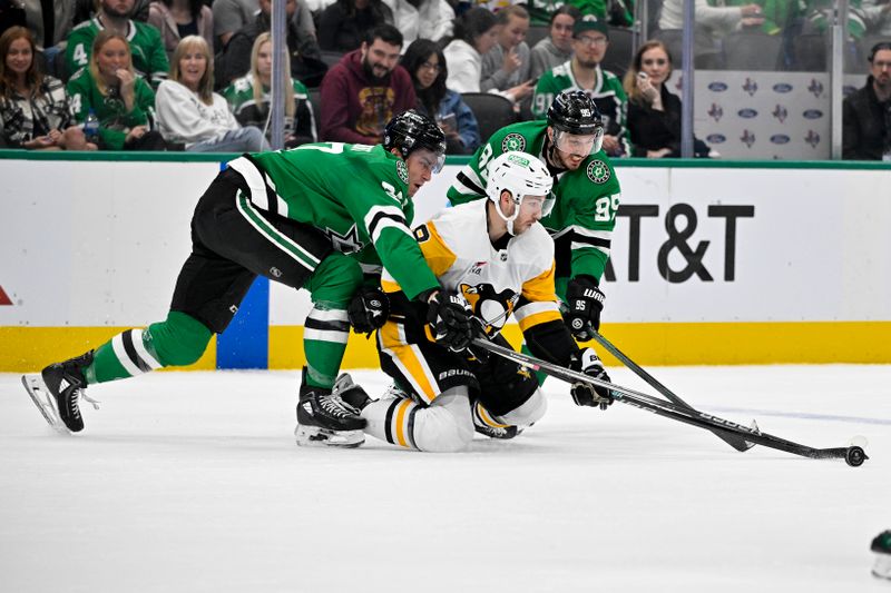 Mar 22, 2024; Dallas, Texas, USA; Dallas Stars left wing Mason Marchment (27) and center Matt Duchene (95) and Pittsburgh Penguins left wing Michael Bunting (8) battle for control of the puck during the third period at the American Airlines Center. Mandatory Credit: Jerome Miron-USA TODAY Sports