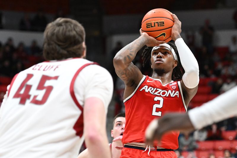 Jan 13, 2024; Pullman, Washington, USA; Arizona Wildcats guard Caleb Love (2) shoots the ball against Washington State Cougars forward Oscar Cluff (45) in the second half at Friel Court at Beasley Coliseum. Washington State won 73-70. Mandatory Credit: James Snook-USA TODAY Sports