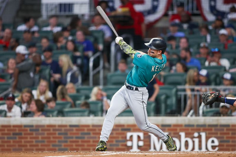 May 20, 2023; Atlanta, Georgia, USA; Seattle Mariners right fielder Jarred Kelenic (10) hits a single against the Atlanta Braves in the fifth inning at Truist Park. Mandatory Credit: Brett Davis-USA TODAY Sports