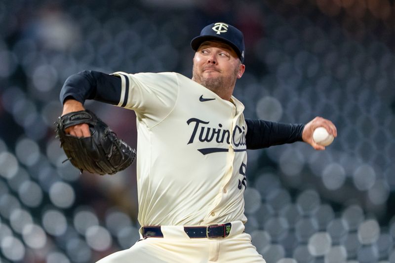 Apr 19, 2024; Minneapolis, Minnesota, USA; Minnesota Twins pitcher Caleb Thielbar (56) delivers a pitch against the Detroit Tigers in the ninth inning at Target Field. Mandatory Credit: Jesse Johnson-USA TODAY Sports