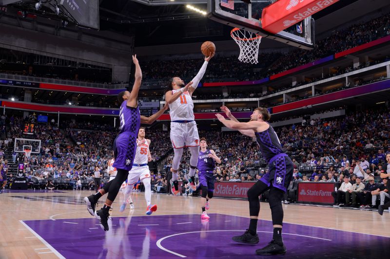 SACRAMENTO, CA - MARCH 16: Jalen Brunson #11 of the New York Knicks drives to the basket during the game against the Sacramento Kings on March 16, 2024 at Golden 1 Center in Sacramento, California. NOTE TO USER: User expressly acknowledges and agrees that, by downloading and or using this Photograph, user is consenting to the terms and conditions of the Getty Images License Agreement. Mandatory Copyright Notice: Copyright 2024 NBAE (Photo by Rocky Widner/NBAE via Getty Images)