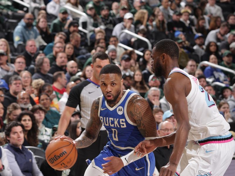 MILWAUKEE, WI - FEBRUARY 23:  Damian Lillard #0 of the Milwaukee Bucks dribbles the ball during the game against the Miami Heat on February 23, 2025 at Fiserv Forum Center in Milwaukee, Wisconsin. NOTE TO USER: User expressly acknowledges and agrees that, by downloading and or using this Photograph, user is consenting to the terms and conditions of the Getty Images License Agreement. Mandatory Copyright Notice: Copyright 2025 NBAE (Photo by Gary Dineen/NBAE via Getty Images).