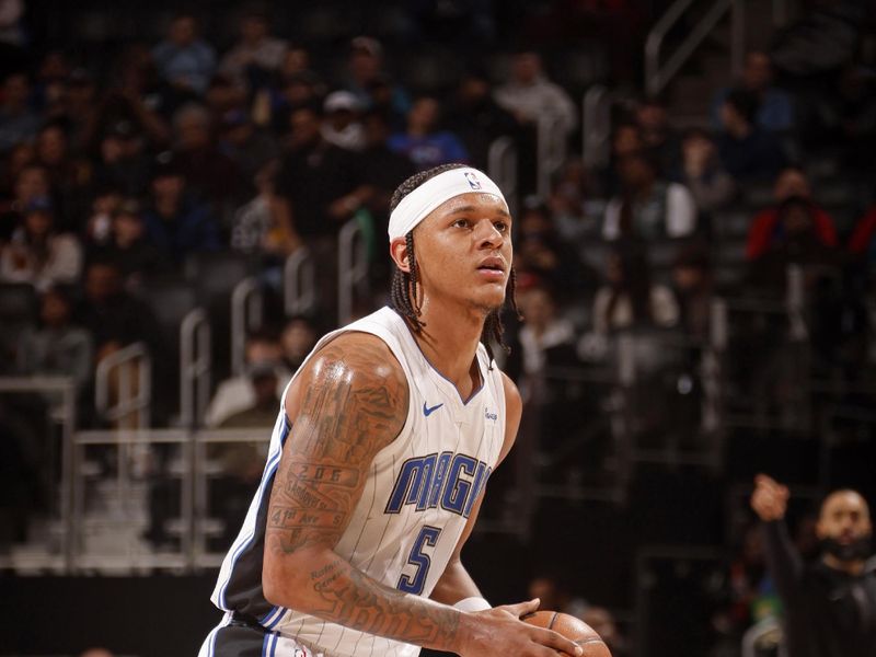 DETROIT, MI - FEBRUARY 4: Paolo Banchero #5 of the Orlando Magic looks to shoot the ball during the game against the Detroit Pistons on February 4, 2024 at Little Caesars Arena in Detroit, Michigan. NOTE TO USER: User expressly acknowledges and agrees that, by downloading and/or using this photograph, User is consenting to the terms and conditions of the Getty Images License Agreement. Mandatory Copyright Notice: Copyright 2024 NBAE (Photo by Brian Sevald/NBAE via Getty Images)