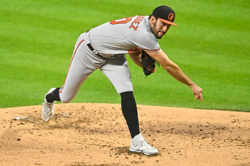 Sep 21, 2023; Cleveland, Ohio, USA; Baltimore Orioles starting pitcher Grayson Rodriguez (30) follows through on a pitch in the second inning against the Cleveland Guardians at Progressive Field. Mandatory Credit: David Richard-USA TODAY Sports