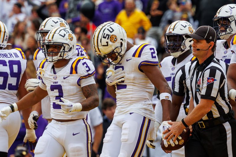 Nov 25, 2023; Baton Rouge, Louisiana, USA;  LSU Tigers wide receiver Kyren Lacy (2) reacts to scoring. Touchdown against the Texas A&M Aggies during the second half at Tiger Stadium. Mandatory Credit: Stephen Lew-USA TODAY Sports