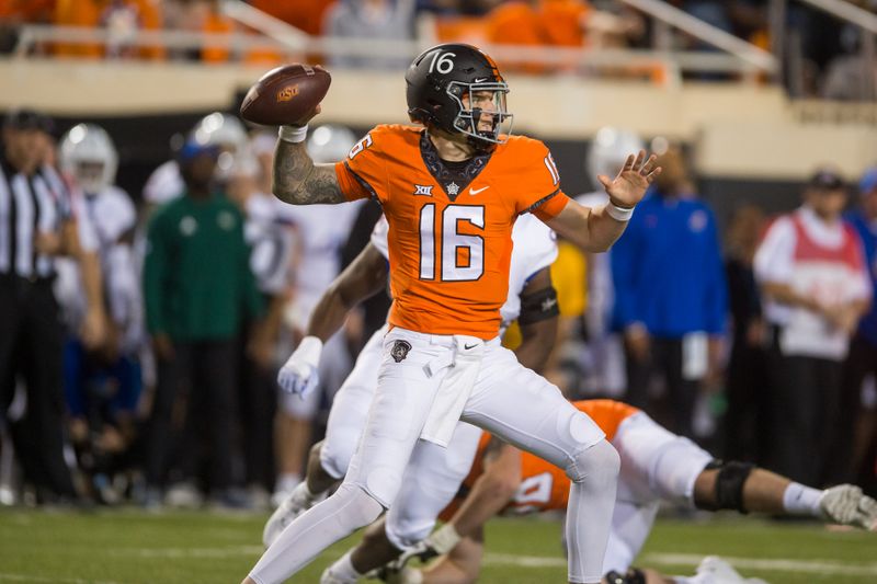 Oct 30, 2021; Stillwater, Oklahoma, USA;  Oklahoma State Cowboys quarterback Shane Illingworth (16) throws a pass during the second quarter in the game against the Kansas Jayhawks at Boone Pickens Stadium. Mandatory Credit: Brett Rojo-USA TODAY Sports