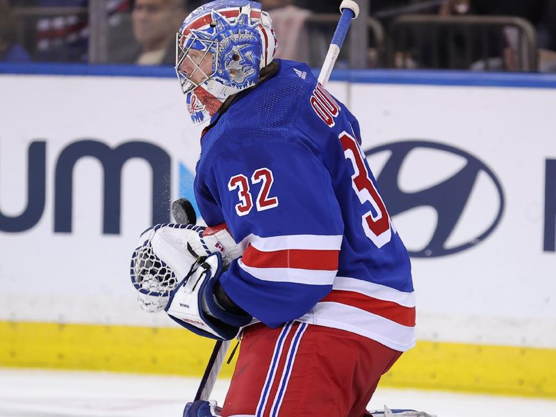 Mar 11, 2024; New York, New York, USA; New York Rangers goaltender Jonathan Quick (32) makes a save against the New Jersey Devils during the second period at Madison Square Garden. Mandatory Credit: Brad Penner-USA TODAY Sports