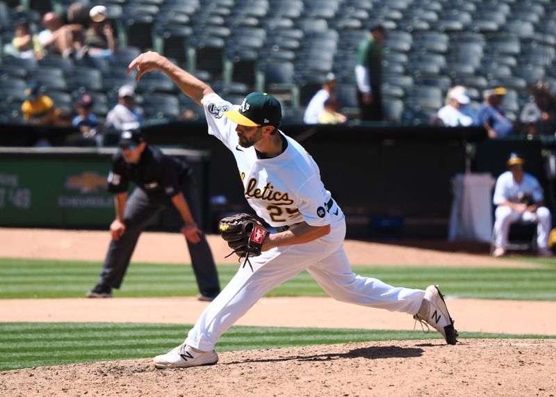 Jun 15, 2023; Oakland, California, USA; Oakland Athletics pitcher Austin Pruitt (29) pitches the ball against the Tampa Bay Rays during the ninth inning at Oakland-Alameda County Coliseum. Mandatory Credit: Kelley L Cox-USA TODAY Sports