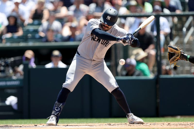 May 10, 2025; West Sacramento, California, USA; New York Yankees catcher Austin Wells (28) is hit by a pitch against the Athletics during the second inning at Sutter Health Park. Mandatory Credit: Dennis Lee-Imagn Images