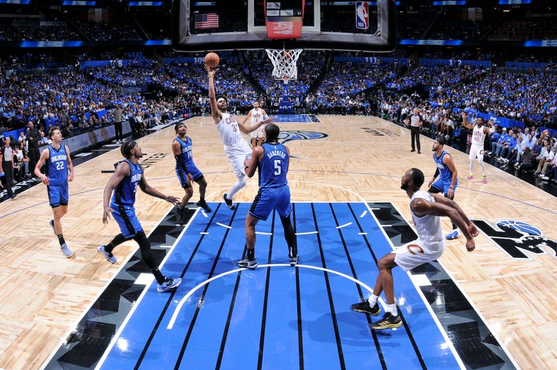 ORLANDO, FL - APRIL 25: Jarrett Allen #31 of the Cleveland Cavaliers goes to the basket during the game  against the Orlando Magic during Round 1 Game 3 of the 2024 NBA Playoffs on April 25, 2024 at Kia Center in Orlando, Florida. NOTE TO USER: User expressly acknowledges and agrees that, by downloading and or using this photograph, User is consenting to the terms and conditions of the Getty Images License Agreement. Mandatory Copyright Notice: Copyright 2023 NBAE (Photo by Fernando Medina/NBAE via Getty Images)