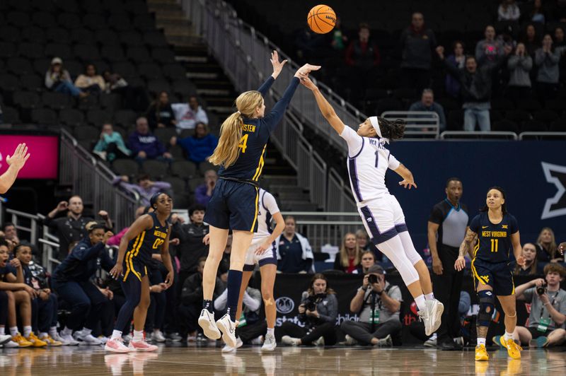 Mar 9, 2024; Kansas City, MO, USA; West Virginia Mountaineers forward Kylee Blacksten (14) shoots the ball while defended by Kansas State Wildcats guard Zyanna Walker (1) during the second half at T-Mobile Center. Mandatory Credit: Amy Kontras-USA TODAY Sports