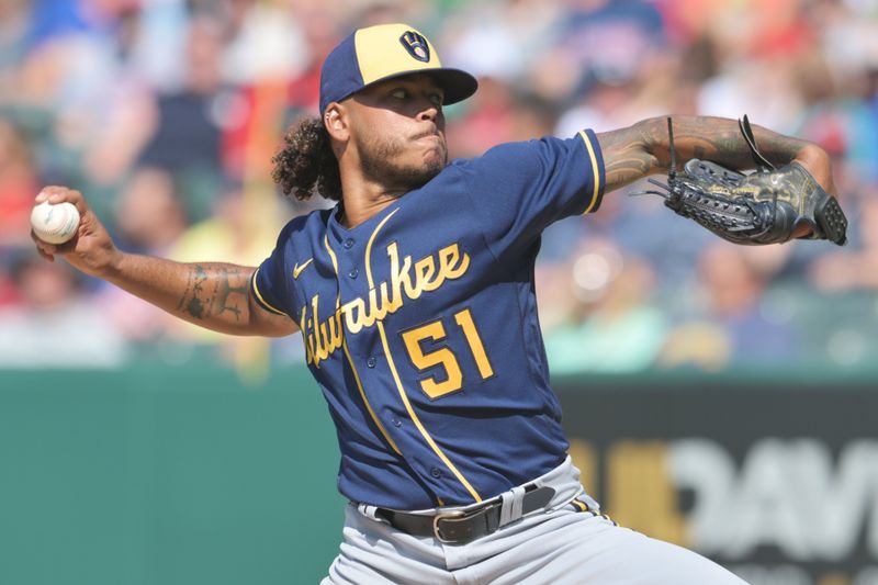 Jun 24, 2023; Cleveland, Ohio, USA; Milwaukee Brewers starting pitcher Freddy Peralta (51) throws a pitch during the first inning against the Cleveland Guardians at Progressive Field. Mandatory Credit: Ken Blaze-USA TODAY Sports