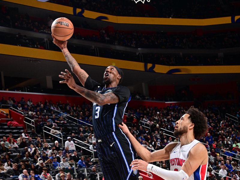 DETROIT, MI - JANUARY 1: Kentavious Caldwell-Pope #3 of the Orlando Magic drives to the basket during the game against the Detroit Pistons on January 1, 2025 at Little Caesars Arena in Detroit, Michigan. NOTE TO USER: User expressly acknowledges and agrees that, by downloading and/or using this photograph, User is consenting to the terms and conditions of the Getty Images License Agreement. Mandatory Copyright Notice: Copyright 2025 NBAE (Photo by Chris Schwegler/NBAE via Getty Images)