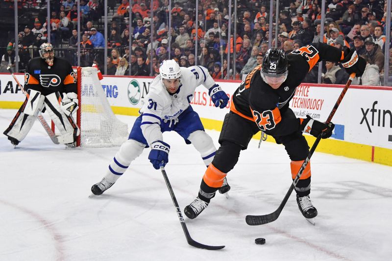 Mar 19, 2024; Philadelphia, Pennsylvania, USA; Philadelphia Flyers defenseman Ronnie Attard (23) clears there puck away from Toronto Maple Leafs center John Tavares (91) during the second period at Wells Fargo Center. Mandatory Credit: Eric Hartline-USA TODAY Sports