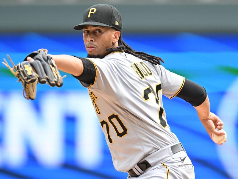 Aug 20, 2023; Minneapolis, Minnesota, USA; Pittsburgh Pirates starting pitcher Osvaldo Bido (70) throws a pitch against the Minnesota Twins during the third inning at Target Field. Mandatory Credit: Jeffrey Becker-USA TODAY Sports