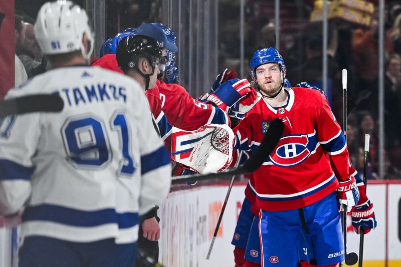 Apr 4, 2024; Montreal, Quebec, CAN; Montreal Canadiens right wing Joel Armia (40) celebrates his second goal of the game against the Tampa Bay Lightning with his teammates at the bench during the second period at Bell Centre. Mandatory Credit: David Kirouac-USA TODAY Sports