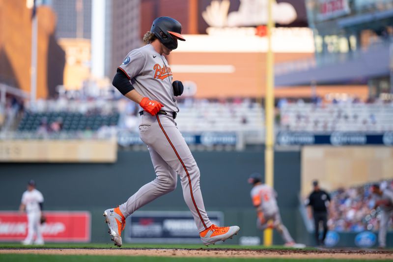 May 6, 2025; Minneapolis, Minnesota, USA; Baltimore Orioles shortstop Gunnar Henderson (2) scores against the Minnesota Twins in the fourth inning at Target Field. Mandatory Credit: Brad Rempel-Imagn Images