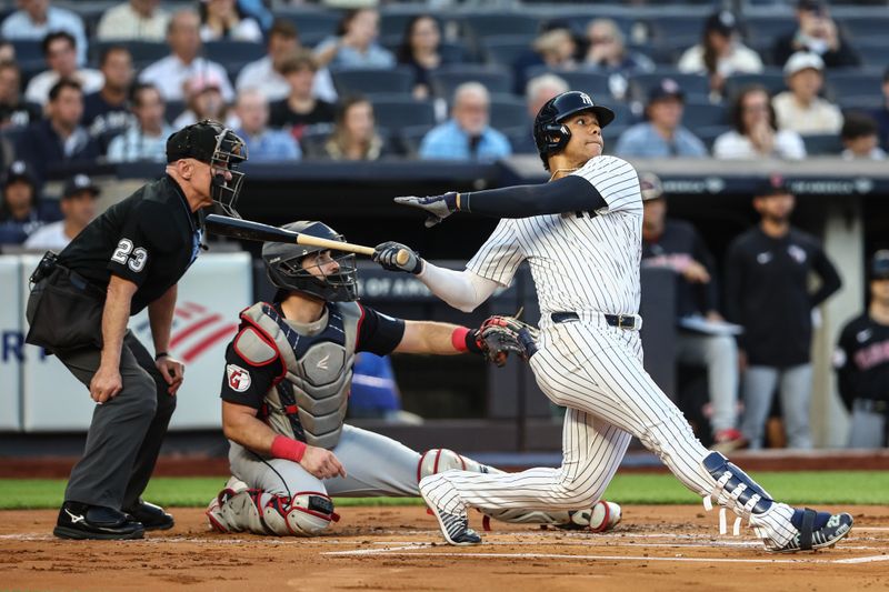 Aug 21, 2024; Bronx, New York, USA;  New York Yankees right fielder Juan Soto (22) hits a two-run home run in the first inning against the Cleveland Guardians at Yankee Stadium. Mandatory Credit: Wendell Cruz-USA TODAY Sports