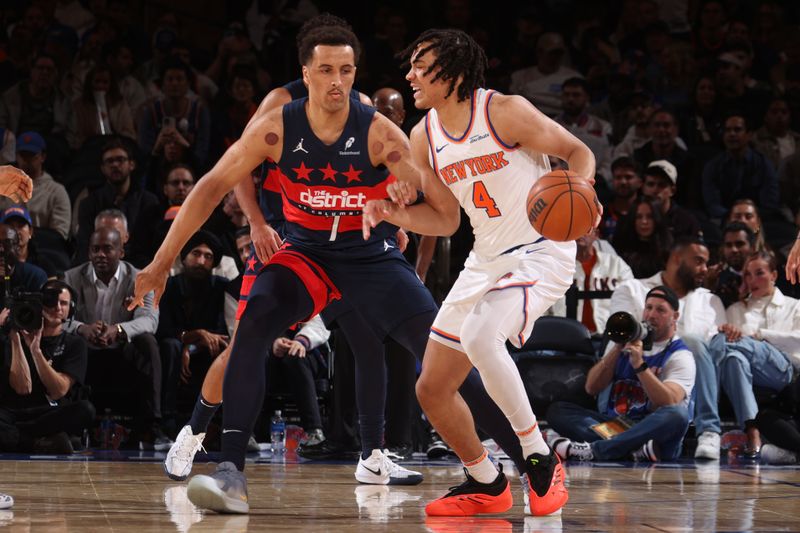 NEW YORK, NY - NOVEMBER 18: Pacome Dadiet #4 of the New York Knicks dribbles the ball during the game against the Washington Wizards on November 18, 2024 at Madison Square Garden in New York City, New York.  NOTE TO USER: User expressly acknowledges and agrees that, by downloading and or using this photograph, User is consenting to the terms and conditions of the Getty Images License Agreement. Mandatory Copyright Notice: Copyright 2024 NBAE  (Photo by Nathaniel S. Butler/NBAE via Getty Images)