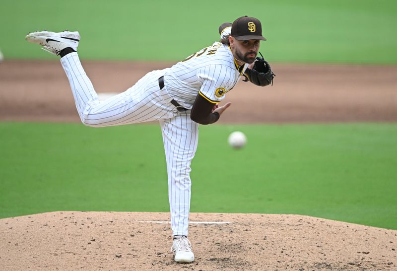 May 28, 2025; San Diego, California, USA; San Diego Padres relief pitcher David Morgan (66) delivers during the sixth inning against the Miami Marlins at Petco Park. Mandatory Credit: Denis Poroy-Imagn Images